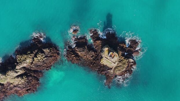 Aerial view of Phare de L Ost Pic lighthouse in Plouezec France.