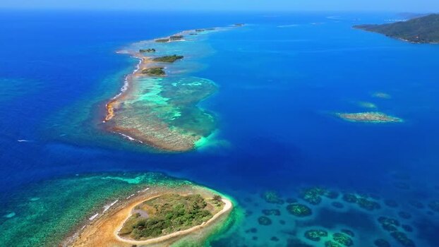 Aerial view of tropical coral reefs and islands in Guanaja Honduras. Aerial view of tropical coral reefs and islands in Guanaja Honduras.
