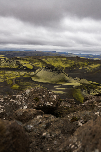 View of moss covered lava fields stretching towards the horizon under a dramatic sky Skaftárhreppur Skaftárhreppur Iceland. View of moss covered lava fields stretching towards the horizon under a dramatic sky Skaftárhreppur Skaftárhreppur Iceland.