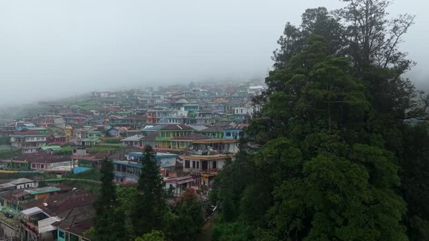 Aerial view of Nepal Van Java village on a misty hill Indonesia.