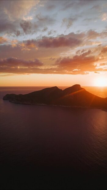 Aerial view of Sa Dragonera island at sunset Spain.