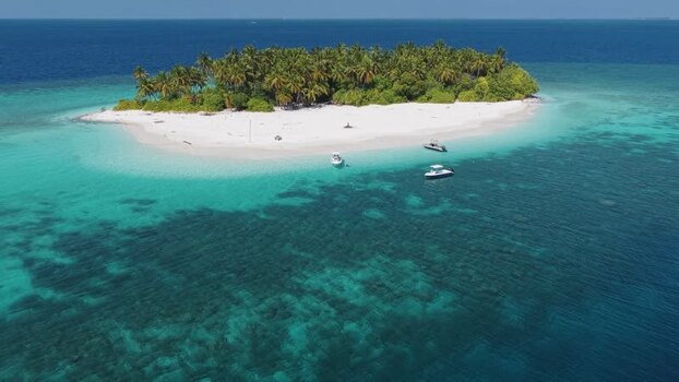 Aerial view of a tropical island with turquoise water Maldives. Aerial view of a tropical island with turquoise water Maldives.