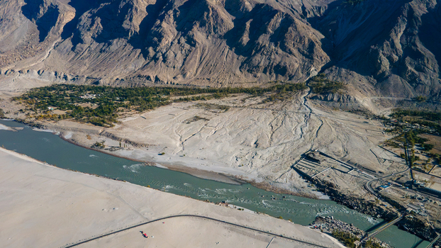 Aerial view of the Indus River flowing through the rugged landscape of Skardu Gilgit Pakistan.