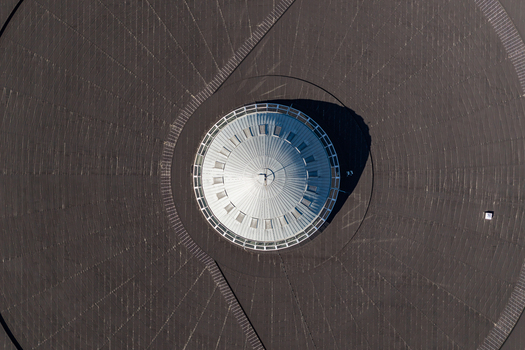 Aerial view of the iconic Spodek arena featuring its distinctive circular metallic roof and geometric patterns in Katowice Wojewodztwo slaskie Poland.