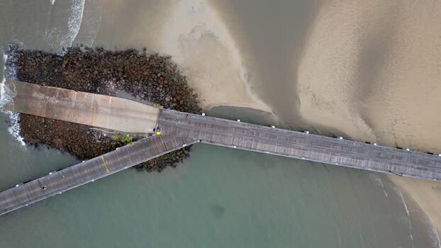 Aerial view of Kingfisher Bay Resort pier on K gari Australia. Aerial view of Kingfisher Bay Resort pier on K gari Australia.