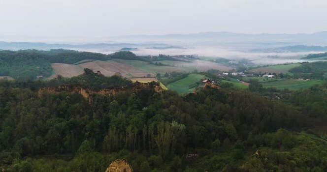 Aerial view of Balze del Valdarno cliffs and misty hills Italy. Aerial view of Balze del Valdarno cliffs and misty hills Italy.