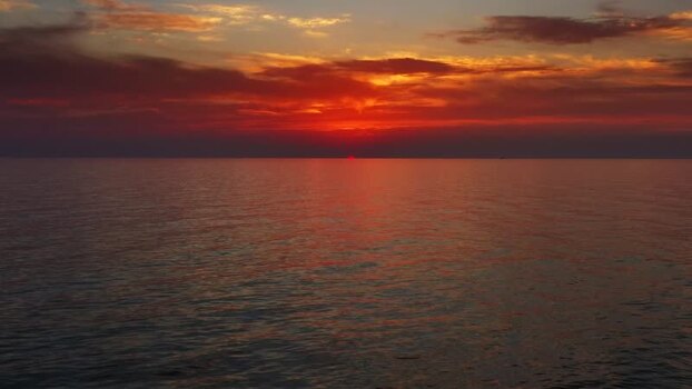 Aerial view of sunset over the calm sea Montenegro. Aerial view of sunset over the calm sea Montenegro.