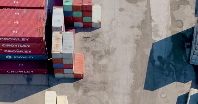 Aerial view of shipping containers in an industrial yard United States. Aerial view of shipping containers in an industrial yard United States.
