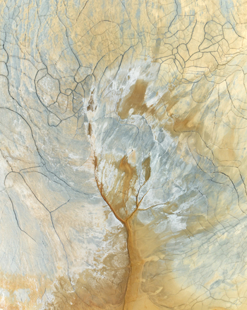 Aerial view of the abstract mineral patterns cracked earth and colorful deposits at the mining site Minas de Riotinto Andalusia Spain.