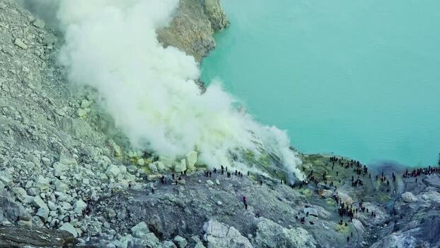View of Ijen volcano with smoke Indonesia.
