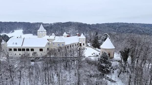 Aerial view of Schloss Kornberg in the snowy Styrian hills Austria. Aerial view of Schloss Kornberg in the snowy Styrian hills Austria.
