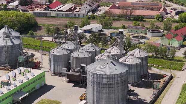 Aerial view of industrial grain silos and storage facility Czechia. Aerial view of industrial grain silos and storage facility Czechia.