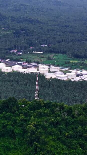 Aerial view of industrial storage tanks in Bali Indonesia.