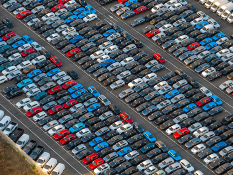Aerial view of rows of new cars parked at the Civitavecchia Port showcasing automotive logistics and orderly vehicle storage in Civitavecchia Lazio Italy. Aerial view of rows of new cars parked at the Civitavecchia Port showcasing automotive logistics and orderly vehicle storage in Civitavecchia Lazio Italy.