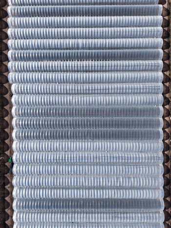 Aerial view of the repetitive and textured patterns of a metallic structure creating an industrial landscape Stafford England United Kingdom. Aerial view of the repetitive and textured patterns of a metallic structure creating an industrial landscape Stafford England United Kingdom.