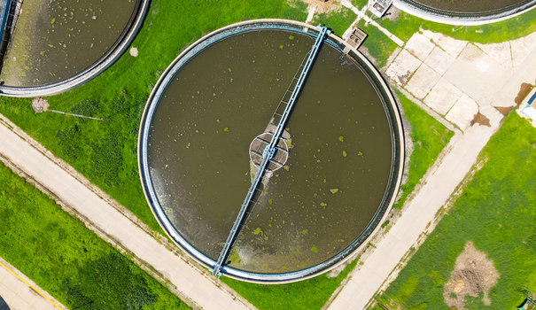 Aerial view of circular water treatment plants contrasting with the surrounding vibrant green fields Puerto Vallarta Mexico. Aerial view of circular water treatment plants contrasting with the surrounding vibrant green fields Puerto Vallarta Mexico.