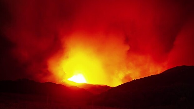 View of volcanic eruption at night in Spain.