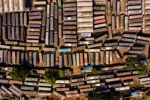 Aerial view of the Gabtoli Bus Terminal with rows of parked buses and terminal infrastructure in Dhaka Dhaka Division Bangladesh.