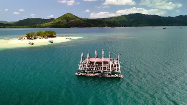Aerial view of Gili Bedis and a fishing platform Indonesia. Aerial view of Gili Bedis and a fishing platform Indonesia.