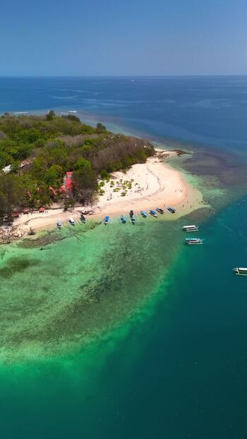 Aerial view of Gili Nanggu island and turquoise sea Indonesia. Aerial view of Gili Nanggu island and turquoise sea Indonesia.