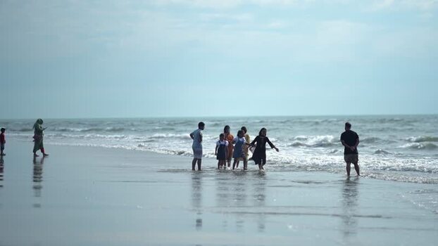 View of people enjoying the beach at Cox s Bazar Bangladesh. View of people enjoying the beach at Cox s Bazar Bangladesh.