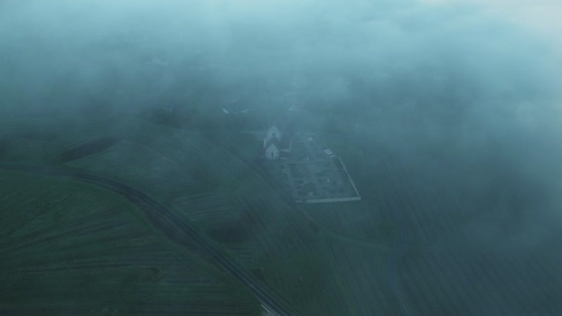 Aerial view of church and cemetery France.