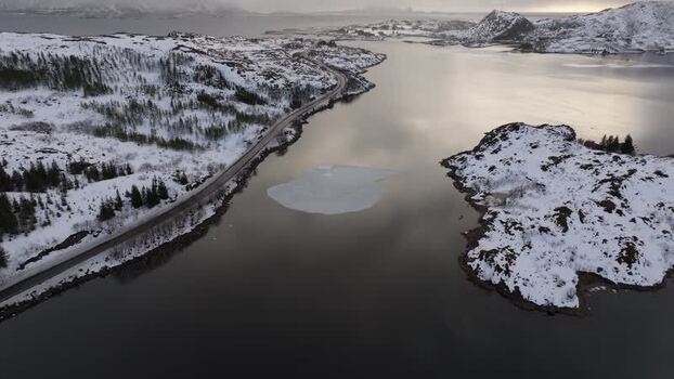 Aerial view of snowy Lofoten landscape in Norway.