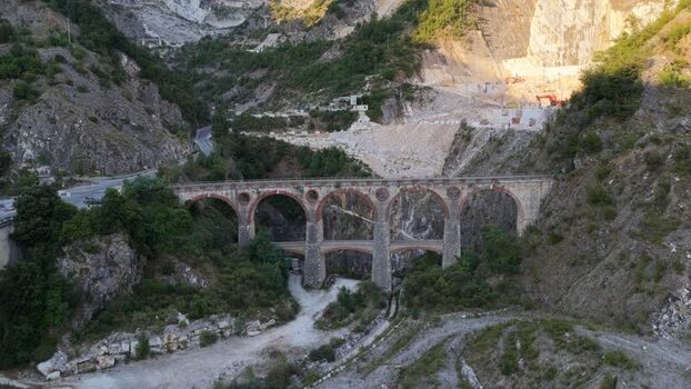 Aerial view of marble quarry bridge in Carrara Italy. Aerial view of marble quarry bridge in Carrara Italy.