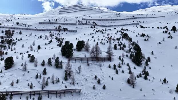 Aerial view of snowy mountain slopes in Nauders Austria.