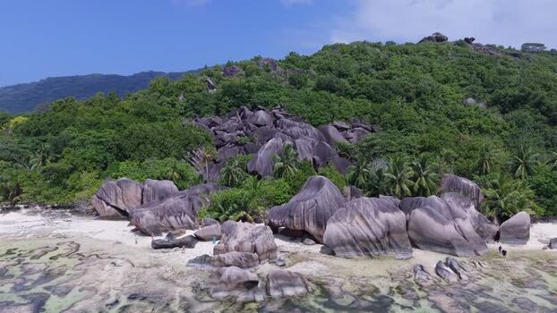Aerial view of Anse Reunion granite boulders Seychelles.