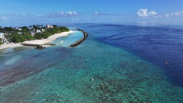 Aerial view of the turquoise lagoon and coral reefs Maldives. Aerial view of the turquoise lagoon and coral reefs Maldives.