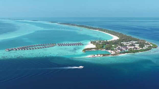 Aerial view of luxury resort and overwater bungalows Maldives. Aerial view of luxury resort and overwater bungalows Maldives.