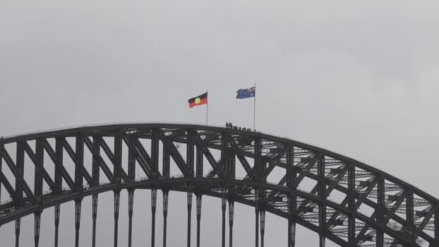 View of Sydney Harbour Bridge with flags Australia.
