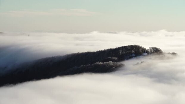 View of Balkan Mountains ridge above clouds Bulgaria.