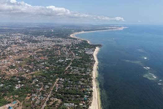 Aerial view of the coastal town of Malindi with its urban landscape sandy beaches and the Indian Ocean along the coastline in Malindi Kilifi County Kenya.