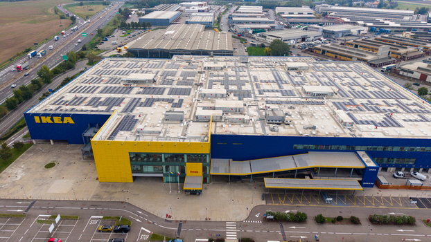 San Giuliano Milanese Lombardia Italy 19 September 2026 Aerial view of the IKEA Milano San Giuliano store with a solar panel roof located next to a highway in an industrial area.