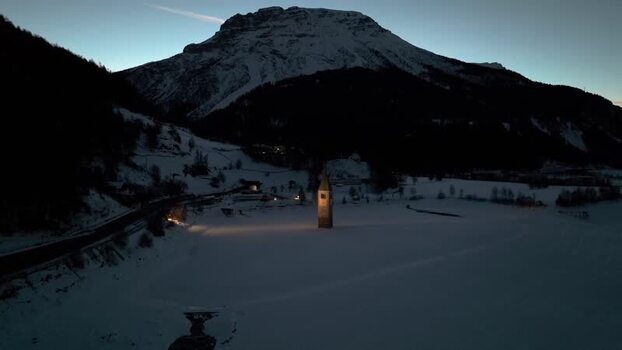 Aerial view of the sunken bell tower in Graun im Vinschgau Italy. Aerial view of the sunken bell tower in Graun im Vinschgau Italy.