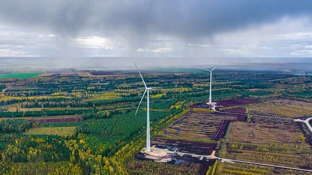 Aerial view of wind turbines in the countryside of Latvia. Aerial view of wind turbines in the countryside of Latvia.