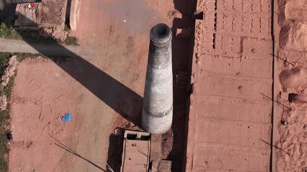 Aerial view of a brick kiln chimney in Dhaka Bangladesh. Aerial view of a brick kiln chimney in Dhaka Bangladesh.