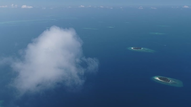 Aerial view of tropical islands and coral reefs Maldives. Aerial view of tropical islands and coral reefs Maldives.
