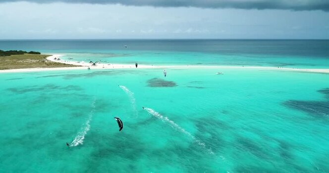 Aerial view of kitesurfers in Los Roques archipelago Venezuela.