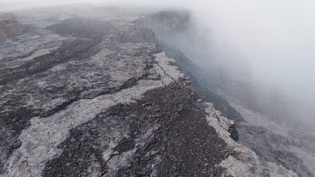 Aerial view of Erta Ale Volcano with steam rising from the crater Ethiopia. Aerial view of Erta Ale Volcano with steam rising from the crater Ethiopia.
