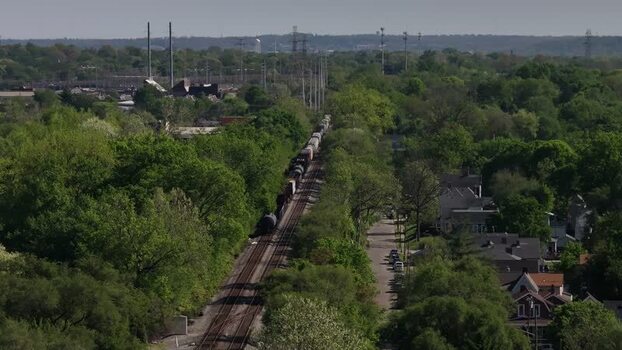 Aerial view of a freight train on tracks in Cincinnati United States. Aerial view of a freight train on tracks in Cincinnati United States.