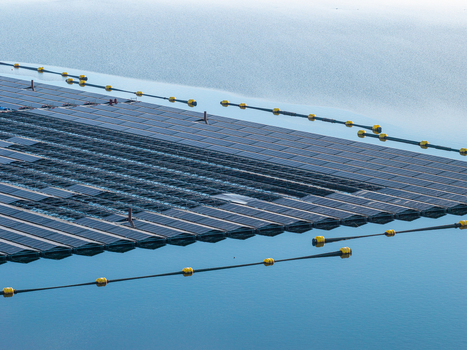 Aerial view of the floating solar park at Cottbuser Ostsee showing damaged panels and ongoing repair works on the water surface in Cottbus Brandenburg Germany. Aerial view of the floating solar park at Cottbuser Ostsee showing damaged panels and ongoing repair works on the water surface in Cottbus Brandenburg Germany.