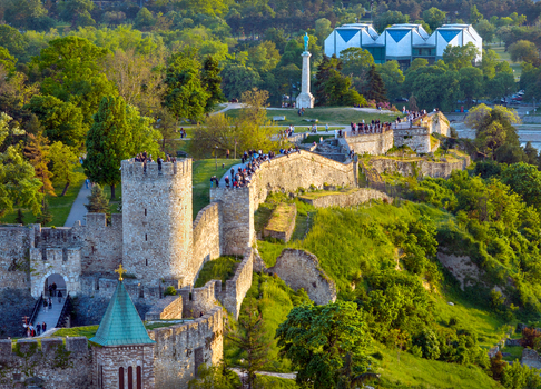Aerial view of the historic Belgrade Fortress with its stone walls and towers surrounded by lush greenery and the Victor monument in Belgrade City of Belgrade Serbia. Aerial view of the historic Belgrade Fortress with its stone walls and towers surrounded by lush greenery and the Victor monument in Belgrade City of Belgrade Serbia.
