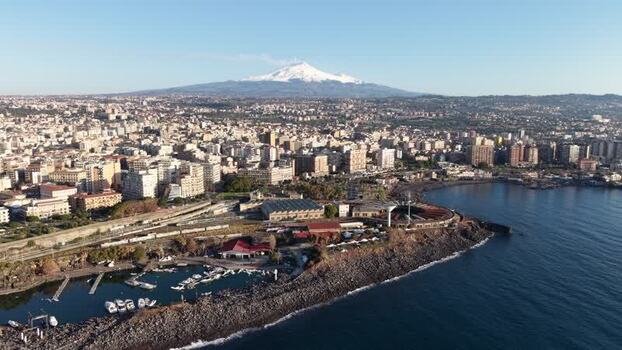 Aerial view of Catania city and Mount Etna volcano Italy. Aerial view of Catania city and Mount Etna volcano Italy.