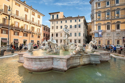 View of the Fontana del Moro in Piazza Navona with its ornate marble sculptures clear water and surrounding historic buildings in Rome Lazio Italy. View of the Fontana del Moro in Piazza Navona with its ornate marble sculptures clear water and surrounding historic buildings in Rome Lazio Italy.