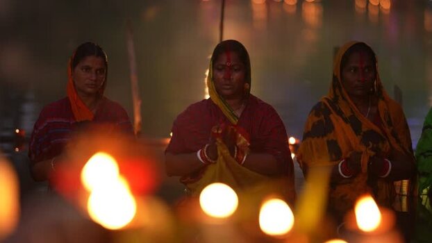 View of women praying during a religious festival Bangladesh. View of women praying during a religious festival Bangladesh.