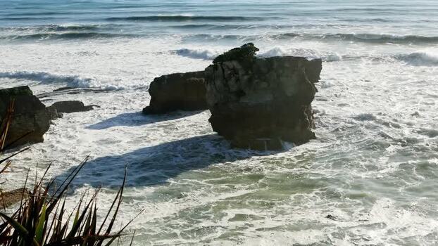 View of Wharariki Beach rock formations New Zealand. View of Wharariki Beach rock formations New Zealand.