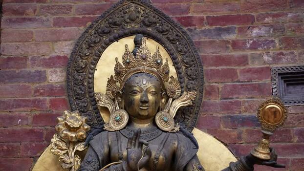 View of a golden deity statue in Nepal.